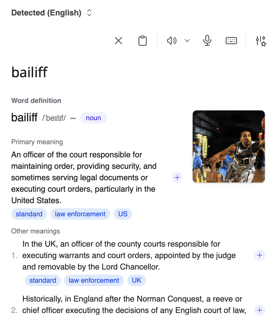 {screenshot of the definition of "bailiff", accompanied by an image of a basketball player}